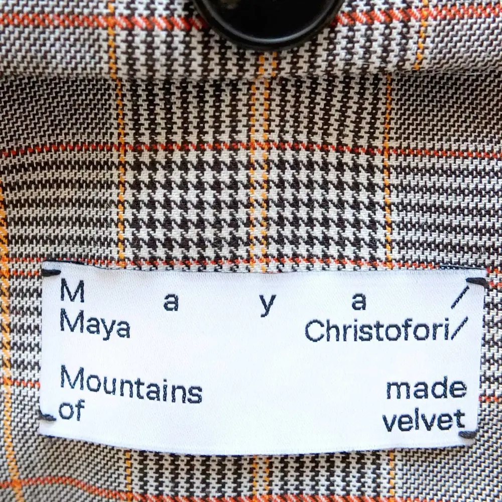Christofori label on houndstooth fabric