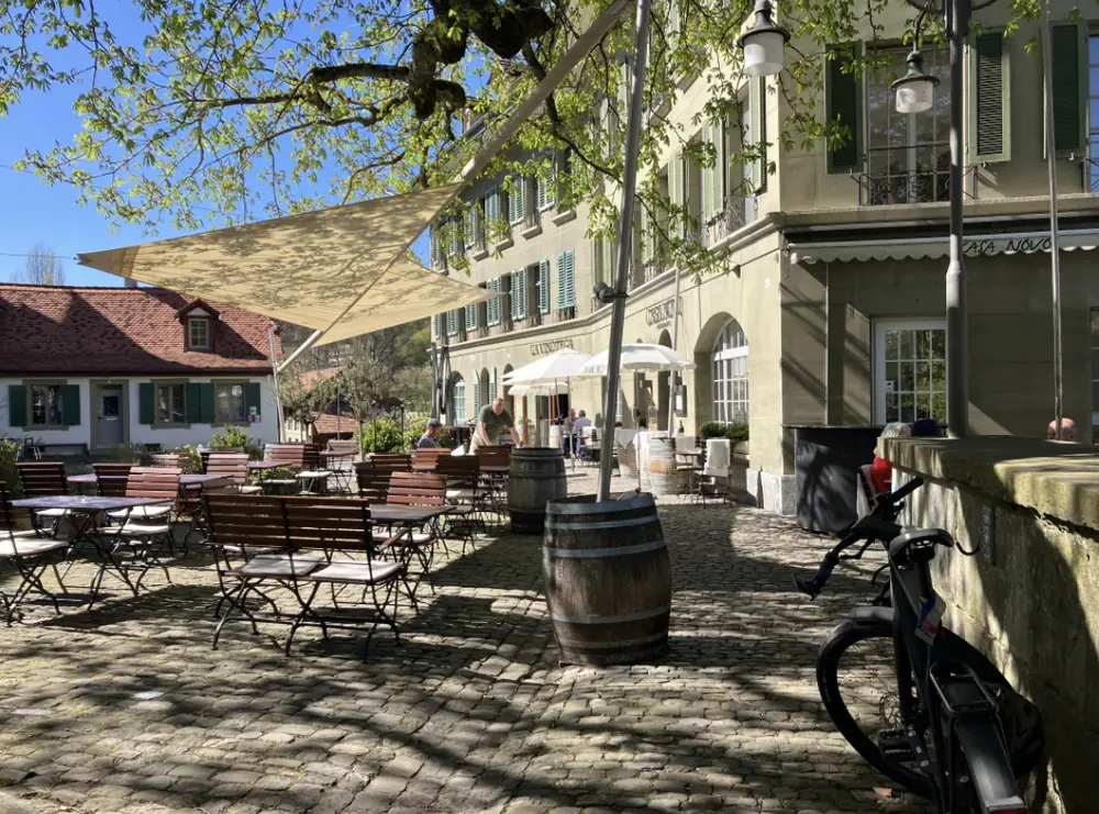 Restaurant terrace under a sail in the lower Old Town